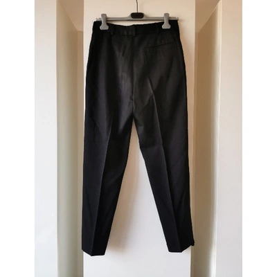 Pre-owned Katharine Hamnett Wool Trousers In Black