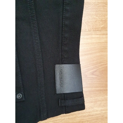 Pre-owned Versace Straight Jeans In Black