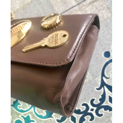 Pre-owned Moschino Leather Wallet In Brown
