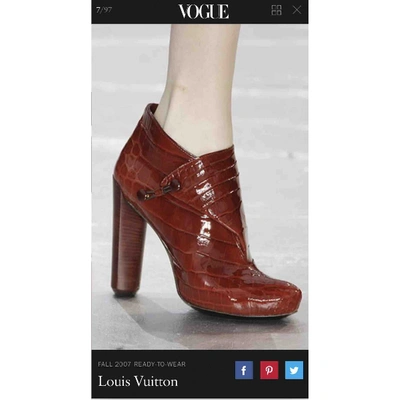 Pre-owned Louis Vuitton Patent Leather Ankle Boots In Burgundy