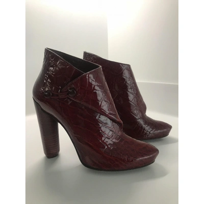 Pre-owned Louis Vuitton Patent Leather Ankle Boots In Burgundy