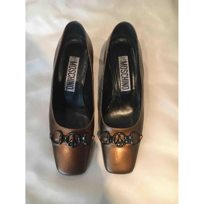 Pre-owned Moschino Patent Leather Heels In Metallic