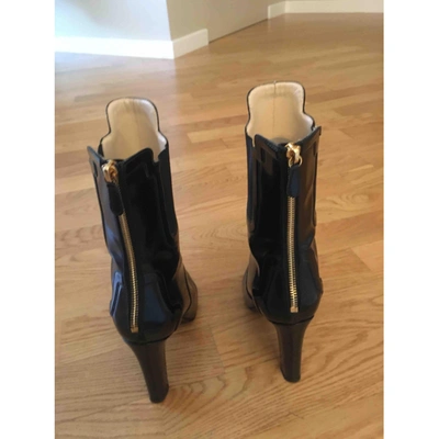 Pre-owned Moschino Patent Leather Ankle Boots In Black