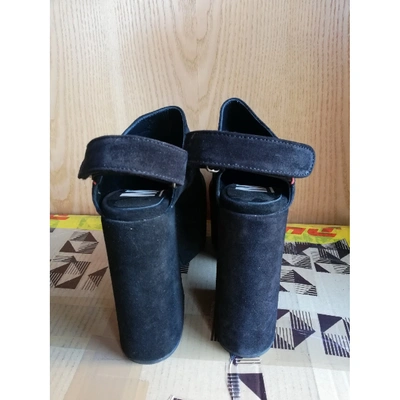 Pre-owned M1992 Leather Mules & Clogs In Black