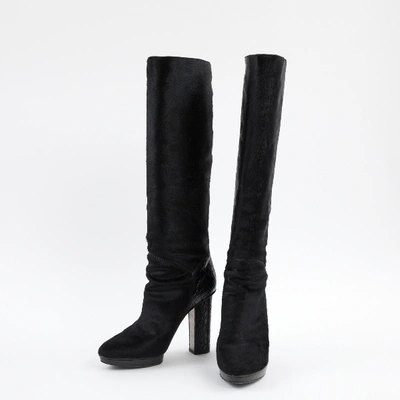 Pre-owned Devi Kroell Pony-style Calfskin Boots In Black