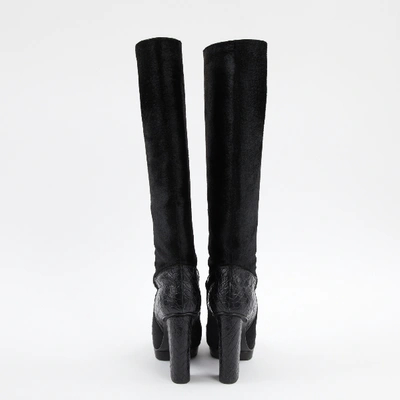 Pre-owned Devi Kroell Pony-style Calfskin Boots In Black