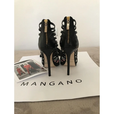 Pre-owned Mangano Leather Sandals In Black