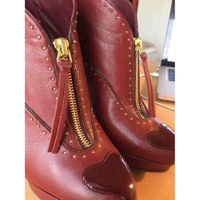 Pre-owned Alexander Mcqueen Leather Ankle Boots In Red