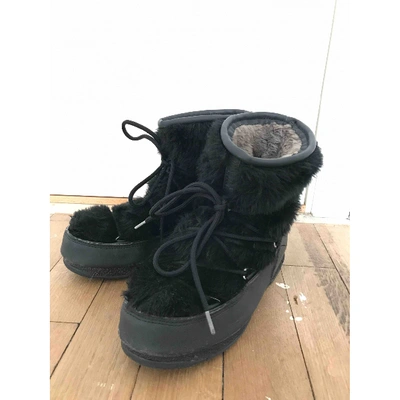 Pre-owned Moon Boot Black Faux Fur Boots