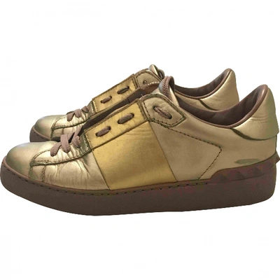 Pre-owned Valentino Garavani Rockstud Patent Leather Trainers In Gold