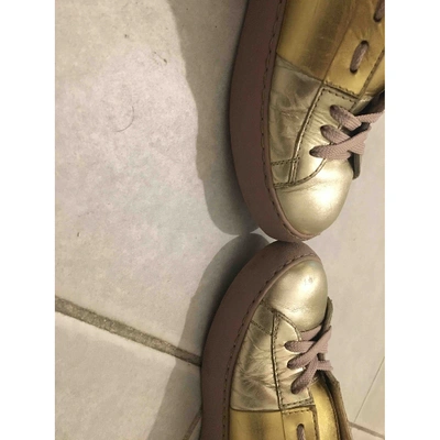 Pre-owned Valentino Garavani Rockstud Patent Leather Trainers In Gold