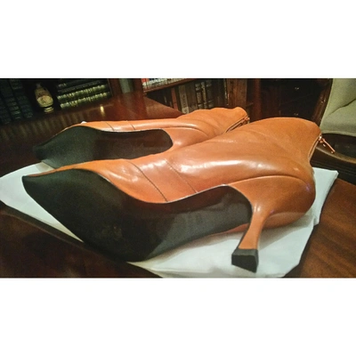 Pre-owned Versace Leather Ankle Boots In Orange