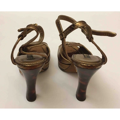 Pre-owned Louis Vuitton Gold Python Heels