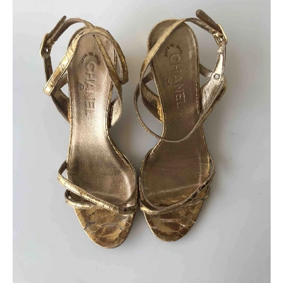 Pre-owned Chanel Gold Python Sandals