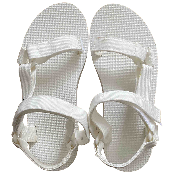white cloth flip flops