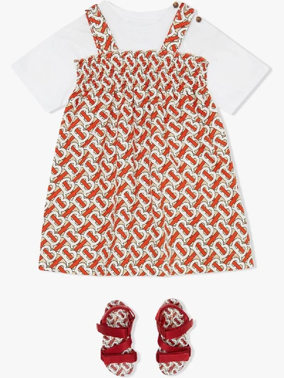 Shop Burberry Smocked Monogram Print Dress In White