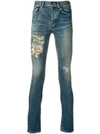 Shop Saint Laurent Skinny Low Rise Distressed Jeans In Grey