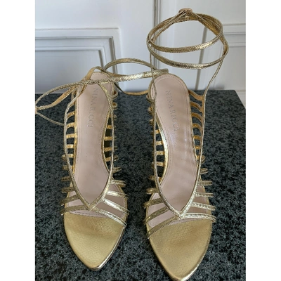 Pre-owned Nina Ricci N Gold Python Sandals