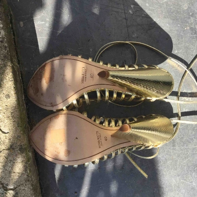 Pre-owned Nina Ricci N Gold Python Sandals