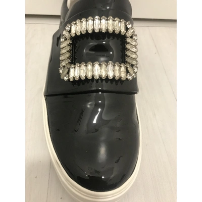 Pre-owned Roger Vivier Sneaky Viv Strass Buckle Patent Leather Trainers In Black