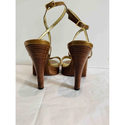 Pre-owned Dolce & Gabbana Patent Leather Sandals In Gold