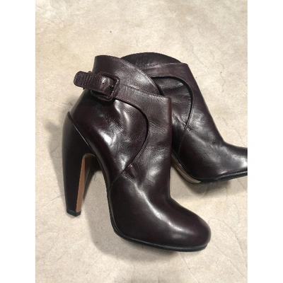 Pre-owned Alaïa Leather Buckled Boots In Burgundy