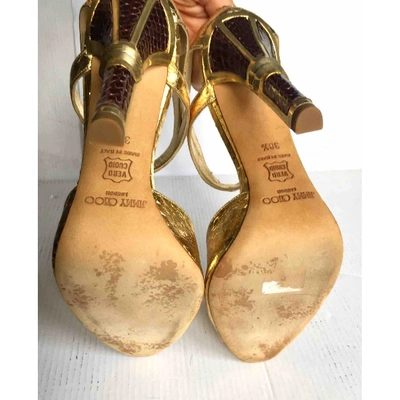 Pre-owned Jimmy Choo Gold Python Sandals
