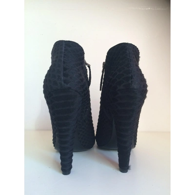 Pre-owned Alaïa Pony-style Calfskin Ankle Boots In Black