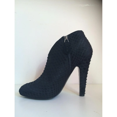 Pre-owned Alaïa Pony-style Calfskin Ankle Boots In Black