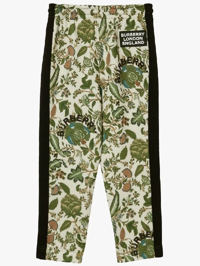 Shop Burberry Botanical Print Track Trousers In Green