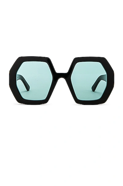 Shop Gucci Runway Geometric Sunglasses In Shiny Black & Green