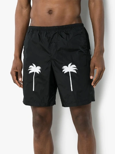 Shop Palm Angels Palm Print Swim Shorts In Black
