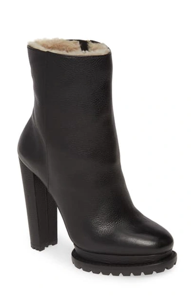 Shop Alice And Olivia Holden Genuine Shearling Bootie In Black Leather
