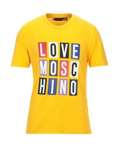 Shop Love Moschino T-shirts In Orange