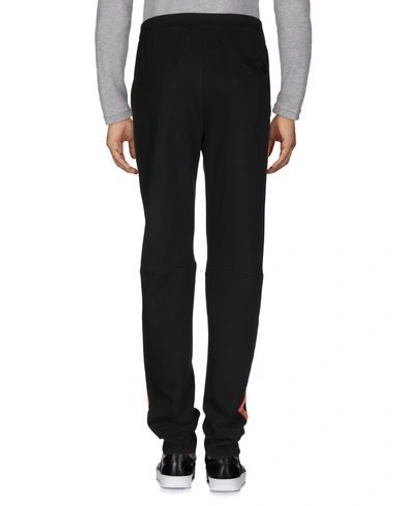 Shop Icosae Casual Pants In Black