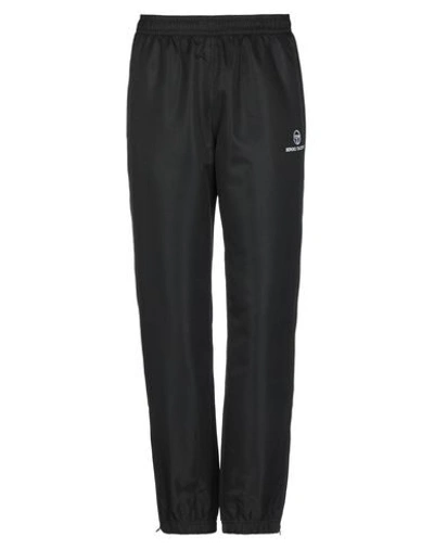 Shop Sergio Tacchini Casual Pants In Black