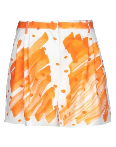 Shop Moschino Shorts & Bermuda In Orange