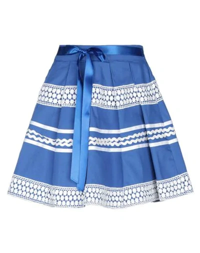 Shop Amuse Mini Skirts In Blue