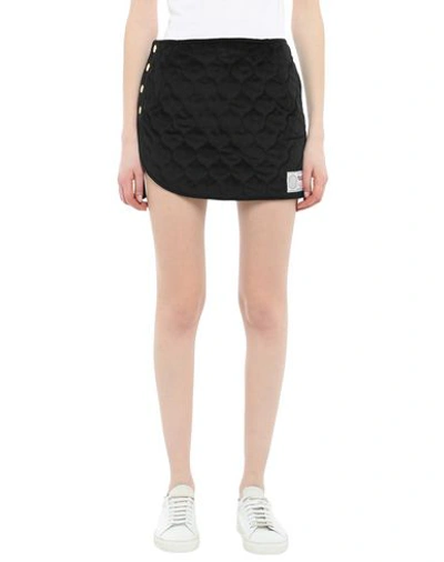 Shop Gcds Mini Skirts In Black