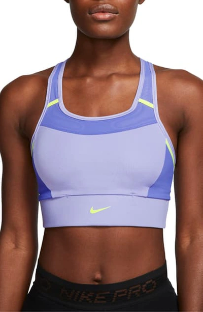 Shop Nike Swoosh Padded Pocket Sports Bra In Light Thistle/ Sapphire