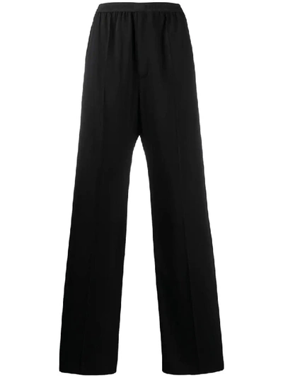 Shop Balenciaga Logo Elastic Waistband Trousers In Black