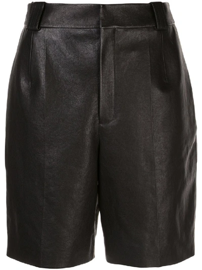 Shop Saint Laurent Pleated Detail Bermuda Leather Shorts In Black