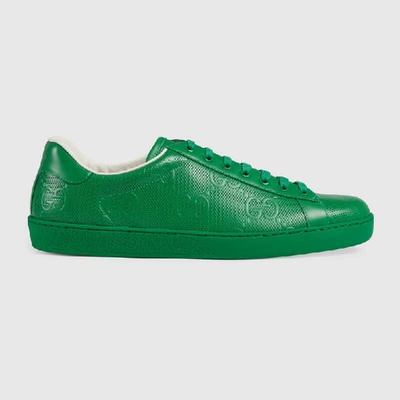 Shop Gucci Men's Ace Gg Embossed Sneaker In Green