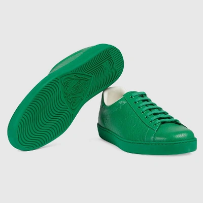 Shop Gucci Men's Ace Gg Embossed Sneaker In Green