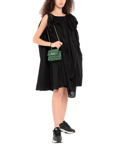 Shop Gcds Cross-body Bags In Black