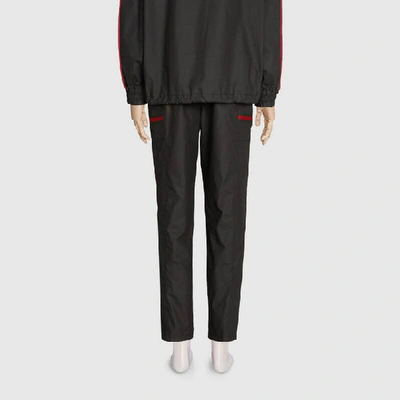 Shop Gucci Coated Cotton Pant With  Label In Black