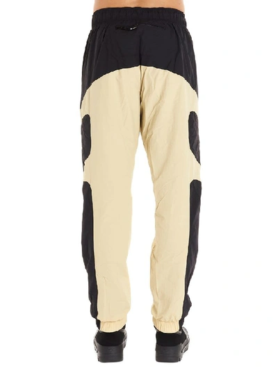 Shop Nike Beige Polyester Joggers