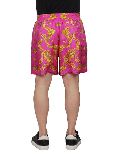 Shop Versace Fuchsia Silk Shorts
