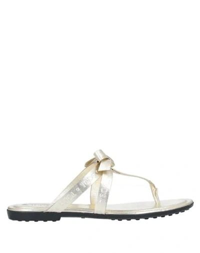 Shop Tod's Toe Strap Sandals In Gold