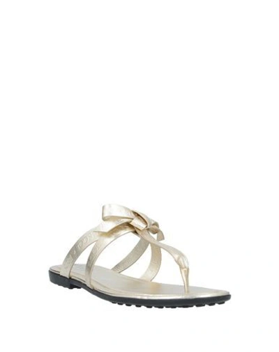 Shop Tod's Toe Strap Sandals In Gold